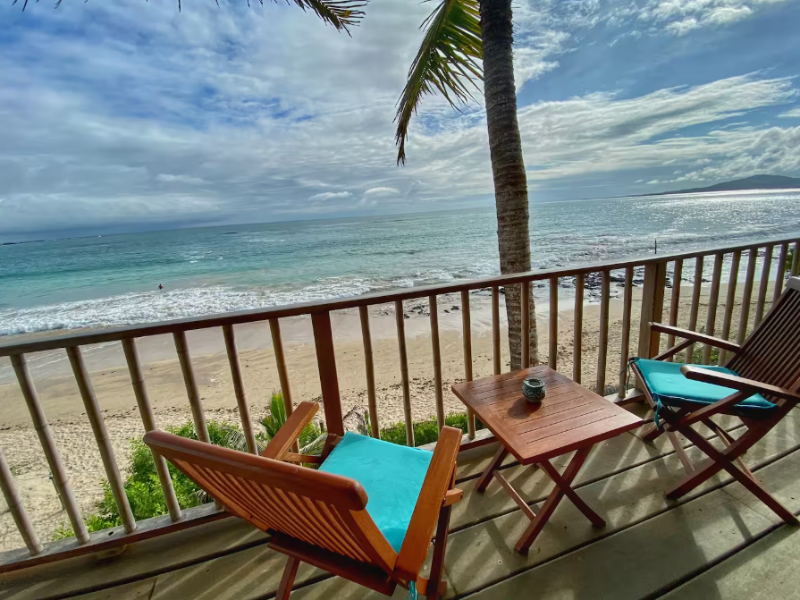 Master suite with a balcony and sea view