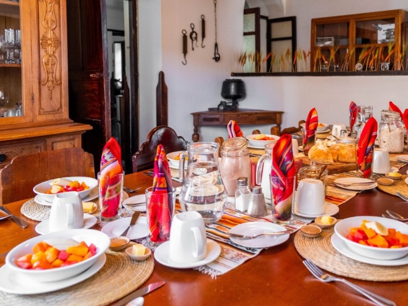 Breakfast is served at the table.