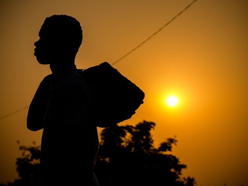 Ghana header- boy with sun