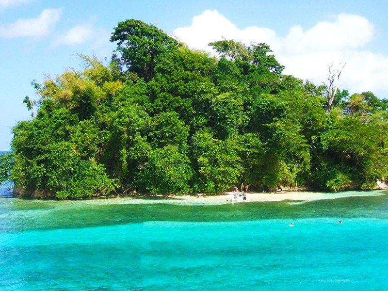 White sand beach with calm waters