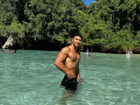 Guy on the beach in Jamaica