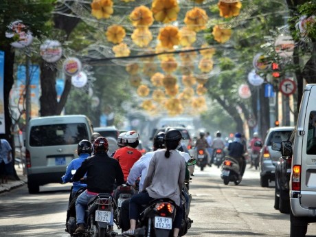 Rollerfahrer in Saigon
