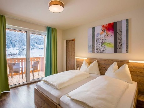 Beispielzimmer des COOEE alpin Hotel 