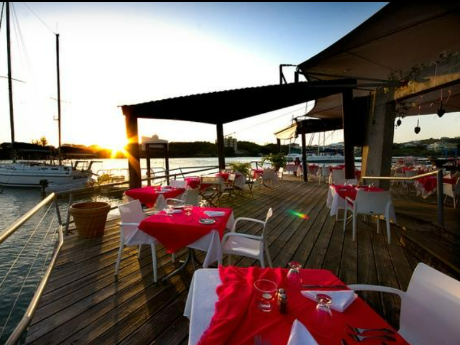 Dodgy Dock Dining Patio - True Blue Bay 